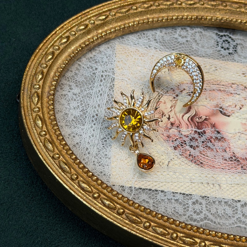 Vintage Yellow Crystal Sun Moo - Vintage Fashion Jewelry Brands recension och pris