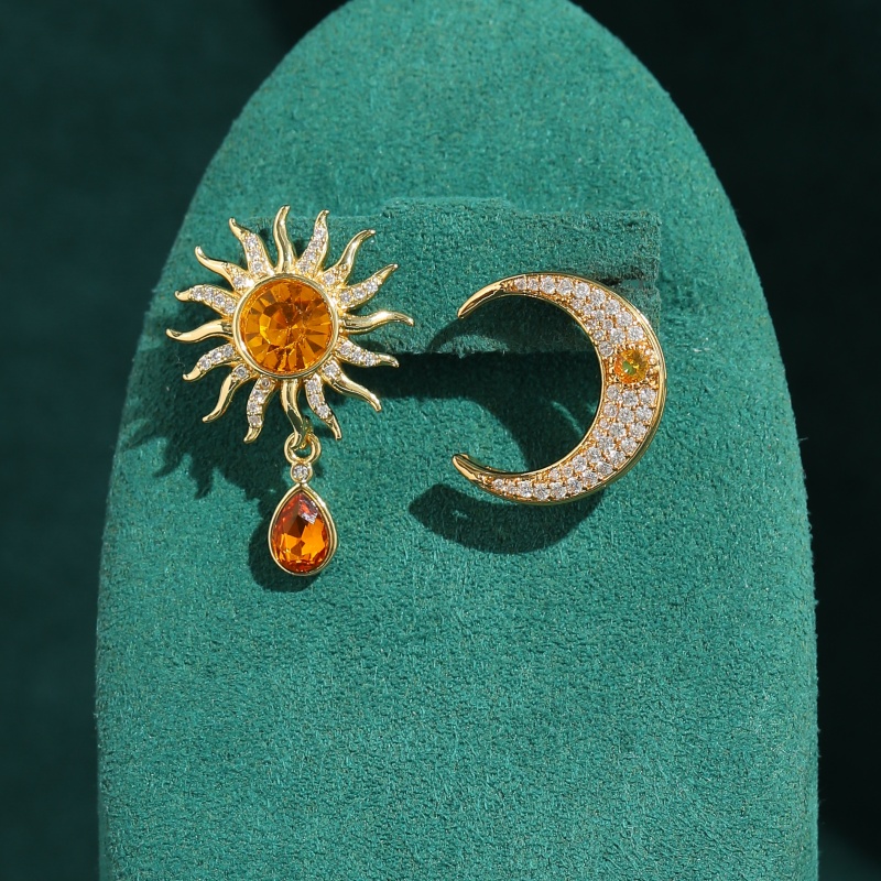Vintage Yellow Crystal Sun Moo - Vintage Fashion Jewelry Brands recension och pris